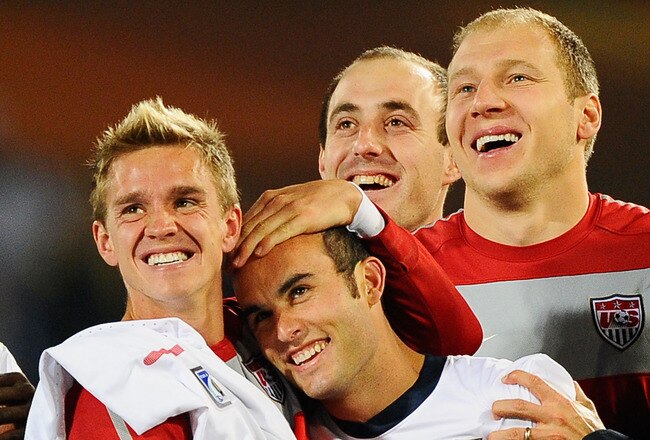 PRETORIA, SOUTH AFRICA - JUNE 23:  Stuart Holden and Landon Donovan of the United States celebrate with team mates the victory that sends the USA through to the second round in the 2010 FIFA World Cup South Africa Group C match between USA and Algeria at the Loftus Versfeld Stadium on June 23, 2010 in Tshwane/Pretoria, South Africa.  (Photo by Kevork Djansezian/Getty Images)