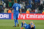 JOHANNESBURG, SOUTH AFRICA - JUNE 24: Daniele De Rossi and Fabio Quagliarella of Italy look dejected during the 2010 FIFA World Cup South Africa Group F match between Slovakia and Italy at Ellis Park Stadium on June 24, 2010 in Johannesburg, South Africa.  (Photo by Claudio Villa/Getty Images)
