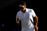 LONDON, ENGLAND - JUNE 23:  Roger Federer of Switzerland in action winning his second round match against Ilija Bozoljac of Serbia on Day Three of the Wimbledon Lawn Tennis Championships at the All England Lawn Tennis and Croquet Club on June 23, 2010 in London, England.  (Photo by Clive Brunskill/Getty Images)