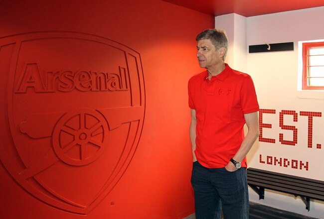 JOHANNESBURG, SOUTH AFRICA - JUNE 10:  Arsene Wenger visits the Nike community training centre in Soweto on June 10, 2010 in Johannesburg, South Africa. One of the changing rooms at the centre is covered in Arsenal logos. (Photo by Ezra Shaw/Getty Images for Nike)