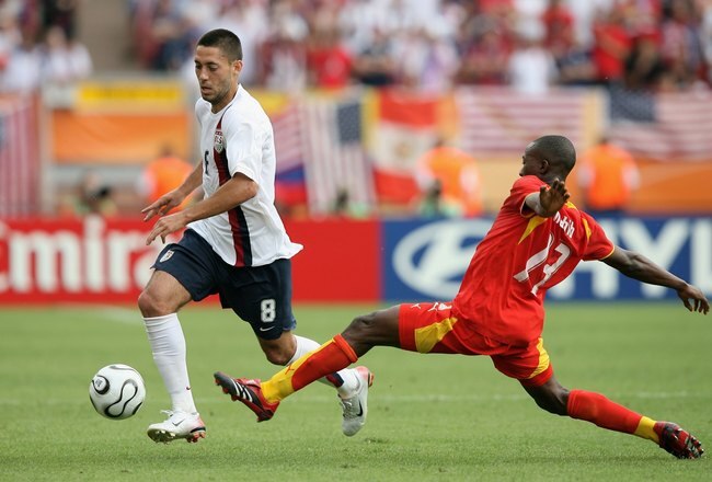 NUREMBERG, GERMANY - JUNE 22:  Clint Dempsey of USA goes past Habib Mohamed of Ghana during the FIFA World Cup Germany 2006 match between Ghana and USA played at the Stadium Nuernberg on June 22, 2006 in Nuremberg, Germany.  (Photo by Clive Brunskill/Getty Images)