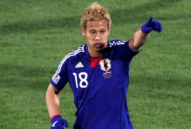 RUSTENBURG, SOUTH AFRICA - JUNE 24:  Keisuke Honda of Japan celebrates scoring the opening goal from a free kick during the 2010 FIFA World Cup South Africa Group E match between Denmark and Japan at the Royal Bafokeng Stadium on June 24, 2010 in Rustenburg, South Africa.  (Photo by Phil Cole/Getty Images)