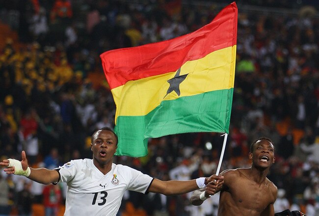 JOHANNESBURG, SOUTH AFRICA - JUNE 23:  Andre Ayew (l) and John Pantsil (r) of Ghana celebrate qualifying for the last sixteen during the 2010 FIFA World Cup South Africa Group D match between Ghana and Germany at Soccer City Stadium on June 23, 2010 in Johannesburg, South Africa.  (Photo by Michael Steele/Getty Images)