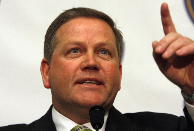 SOUTH BEND, IN - DECEMBER 11: Brian Kelly attends a press conference where he was named new football head coach at Notre Dame University on December 11, 2009 in South Bend, Indiana.  Kelly most recently led the University of Cincinnati to two consecutive Bowl Championship Series appearances including a perfect 12-0 record this past season. (Photo by Frank Polich/Getty Images)