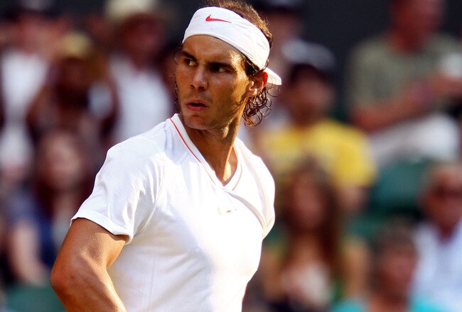 LONDON, ENGLAND - JUNE 26:  Rafael Nadal of Spain reacts during his match against Philip Petzschner of Germany on Day Six of the Wimbledon Lawn Tennis Championships at the All England Lawn Tennis and Croquet Club on June 26, 2010 in London, England.  (Photo by Julian Finney/Getty Images)