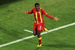 RUSTENBURG, SOUTH AFRICA - JUNE 26:  Asamoah Gyan of Ghana celebrates scoring his team's second goal in extra time during the 2010 FIFA World Cup South Africa Round of Sixteen match between USA and Ghana at Royal Bafokeng Stadium on June 26, 2010 in Rustenburg, South Africa.  (Photo by Martin Rose/Getty Images)