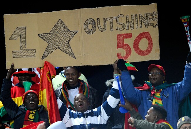 RUSTENBURG, SOUTH AFRICA - JUNE 26: Ghana fans hold up a banner in celebration during the 2010 FIFA World Cup South Africa Round of Sixteen match between USA and Ghana at Royal Bafokeng Stadium on June 26, 2010 in Rustenburg, South Africa.  (Photo by Kevork Djansezian/Getty Images)