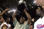 AUBURN HILLS, MI - JUNE 1:  (L-R) Chauncey Billups #1, Rasheed Wallace #30, President of Basketball Operations Joe Dumars (holding trophy) and Ben Wallace #3 of the Detroit Pistons celebrate their win over the Indiana Pacers in Game six of the Eastern Conference Finals during the 2004 NBA Playoffs at The Palace of Auburn Hills on June 1, 2004 in Auburn Hills, Michigan.  The Pistons defeated the Pacers 69-65 and won the 2004 Eastern Conference Championship.  NOTE TO USER: User expressly acknowledges and agrees that, by downloading and/or using this Photograph, user is consenting to the terms and conditions of the Getty Images License Agreement. (Photo by Tom Pidgeon/Getty Images)
