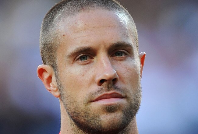 PORT ELIZABETH, SOUTH AFRICA - JUNE 23: Matthew Upson lines up for the national anthems prior to the 2010 FIFA World Cup South Africa Group C match between Slovenia and England at the Nelson Mandela Bay Stadium on June 23, 2010 in Port Elizabeth, South Africa.  (Photo by Michael Regan/Getty Images)