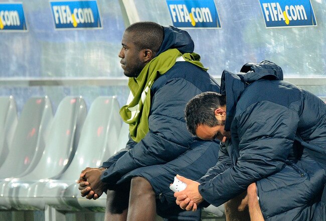 RUSTENBURG, SOUTH AFRICA - JUNE 26: Jozy Altidore (L) of the United States sits dejected with Landon Donovan after the 2010 FIFA World Cup South Africa Round of Sixteen match between USA and Ghana at Royal Bafokeng Stadium on June 26, 2010 in Rustenburg, South Africa.  (Photo by Kevork Djansezian/Getty Images)