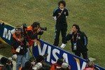 JOHANNESBURG, SOUTH AFRICA - JUNE 27:  Diego Maradona head coach of Argentina acknowledges the support as his players warm up prior to the 2010 FIFA World Cup South Africa Round of Sixteen match between Argentina and Mexico at Soccer City Stadium on June 27, 2010 in Johannesburg, South Africa.  (Photo by Lars Baron/Getty Images)