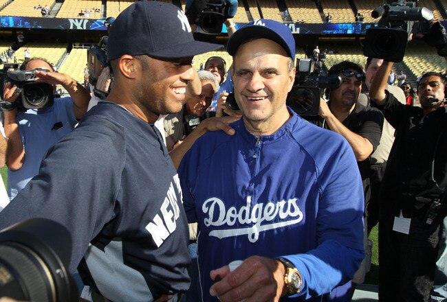 LOS ANGELES, CA - JUNE 25:  Mariano Rivera #42 of the New York Yankees greets manager Joe Torre of the Los Angeles Dodgers before their game on June 25, 2010 at Dodger Stadium in Los Angeles, California.  (Photo by Stephen Dunn/Getty Images)