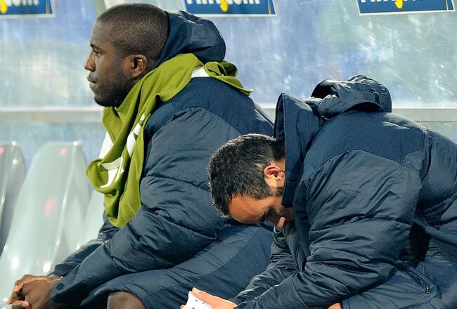 RUSTENBURG, SOUTH AFRICA - JUNE 26: Jozy Altidore (L) of the United States sits dejected with Landon Donovan after the 2010 FIFA World Cup South Africa Round of Sixteen match between USA and Ghana at Royal Bafokeng Stadium on June 26, 2010 in Rustenburg, South Africa.  (Photo by Kevork Djansezian/Getty Images)