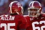 TUSCALOOSA, AL - NOVEMBER 07:  Terrence Cody #62 and Rolando McClain #25 of the Alabama Crimson Tide against the Louisiana State University Tigers at Bryant-Denny Stadium on November 7, 2009 in Tuscaloosa, Alabama.  (Photo by Kevin C. Cox/Getty Images)