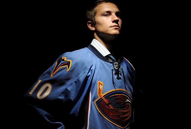 LOS ANGELES, CA - JUNE 25:  Alexander Burmistrov, drafted eighth overall by the Atlanta Thrashers, poses on stage during the 2010 NHL Entry Draft at Staples Center on June 25, 2010 in Los Angeles, California.  (Photo by Harry How/Getty Images)