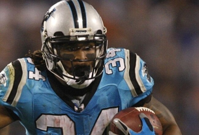 CHARLOTTE - NOVEMBER 19: DeAngelo Williams #34 of the Carolina Panthers runs the ball for a long gain in the second half against the Miami Dolphins at Bank of America Stadium on November 19, 2009 in Charlotte, North Carolina.  (Photo by Streeter Lecka/Getty Images)