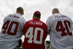 TAMPA, FL - FEBRUARY 01:  Arizona Cardinals fans wearing Pat Tillman jerseys (L-R) Dave Schile, Bruce Goff and Dave Schile Jr. look on outside of Raymond James Stadium before Super Bowl XLIII on February 1, 2009 at Raymond James Stadium in Tampa, Florida.  (Photo by Al Bello/Getty Images)
