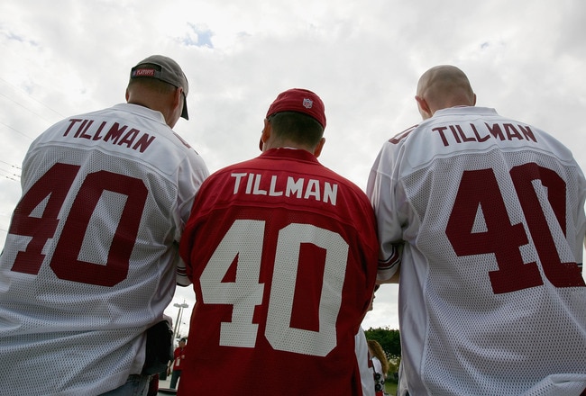 TAMPA, FL - FEBRUARY 01:  Arizona Cardinals fans wearing Pat Tillman jerseys (L-R) Dave Schile, Bruce Goff and Dave Schile Jr. look on outside of Raymond James Stadium before Super Bowl XLIII on February 1, 2009 at Raymond James Stadium in Tampa, Florida.  (Photo by Al Bello/Getty Images)