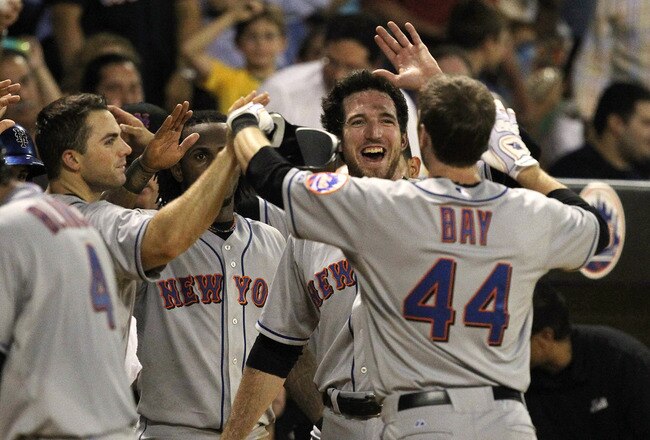 SAN JUAN, PUERTO RICO - JUNE 28:  Jason Bay #44 of the New York Mets is greeted at home after hitting a home run against the Florida Marlins during their game at Hiram Bithorn Stadium on June 28, 2010 in San Juan, Puerto Rico.  (Photo by Al Bello/Getty Images)