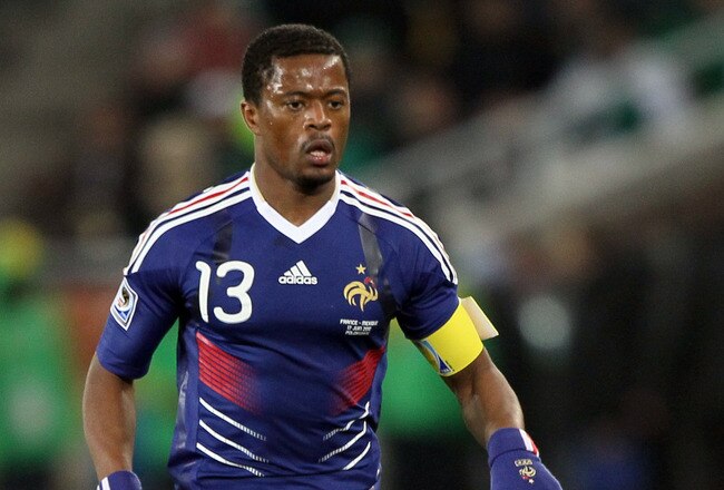 POLOKWANE, SOUTH AFRICA - JUNE 17:  Patrice Evra of France runs with the ball during the 2010 FIFA World Cup South Africa Group A match between France and Mexico at the Peter Mokaba Stadium on June 17, 2010 in Polokwane, South Africa.  (Photo by Christof Koepsel/Getty Images)