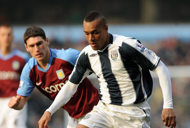 BIRMINGHAM, UNITED KINGDOM - JANUARY 10:  Jay Simpson of West Bromwich Albion breaks away from Gareth Barry of Astoin Villa during the Barclays Premier League match between Aston Villa and West Bromwich Albion at Villa Park on January 10, 2009 in Birmingham, England.  (Photo by Shaun Botterill/Getty Images)
