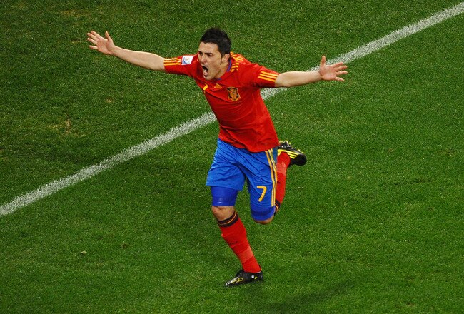 CAPE TOWN, SOUTH AFRICA - JUNE 29:  David Villa of Spain celebrates scoring the opening goal during the 2010 FIFA World Cup South Africa Round of Sixteen match between Spain and Portugal at Green Point Stadium on June 29, 2010 in Cape Town, South Africa.  (Photo by Laurence Griffiths/Getty Images)