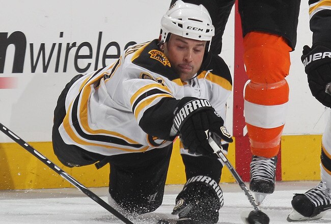 PHILADELPHIA - MAY 12: Marc Svaard #91 of the Boston Bruins reaches out for the puck against the Philadelphia Flyers in Game Six of the Eastern Conference Semifinals during the 2010 NHL Stanley Cup Finals at the Wachovia Center on May 12, 2010 in Philadelphia, Pennsylvania. The Flyers defeated the Bruins 2-1. (Photo by Bruce Bennett/Getty Images)