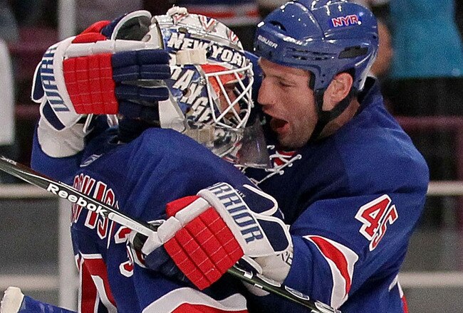 NEW YORK - APRIL 09: Henrik Lundqvist #30 of the New York Rangers celebrates victory with team mate Jody Shelley #45 against the Philadelphia Flyers during their game on April 9, 2010 at Madison Square Garden in New York City.  (Photo by Chris McGrath/Getty Images)