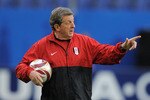 HAMBURG, GERMANY - MAY 11:  Head coach Roy Hodgson issues instructions during the Fulham training session ahead of the UEFA Europa League final match against Atletico Madrid at HSH Nordbank Arena on May 11, 2010 in Hamburg, Germany.  (Photo by Michael Regan/Getty Images)