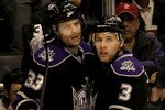 LOS ANGELES - MARCH 8:  Fredrik Modin #33 and Jack Johnson #3 of the Los Angeles Kings celebrates Modin's second period goal against the Columbus Blue Jackets on March 8, 2010 at Staples Center in Los Angeles, California.  (Photo by Stephen Dunn/Getty Images)
