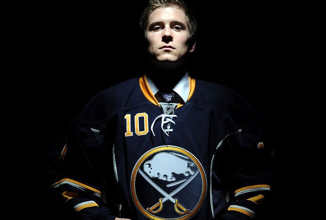 LOS ANGELES, CA - JUNE 25:  Mark Pysyk, drafted 23rd overall by the Buffalo Sabres, poses on stage during the 2010 NHL Entry Draft at Staples Center on June 25, 2010 in Los Angeles, California.  (Photo by Harry How/Getty Images)