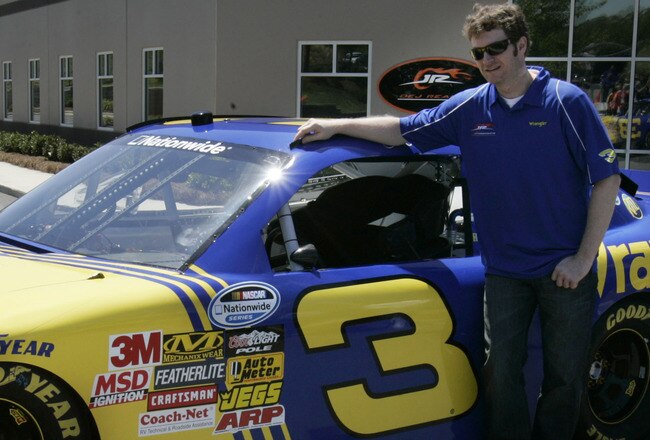MOORESVILLE, NC - APRIL 29: Dale Earnhardt Jr., co-owner of JR Motorsports, stands with the #3 Wrangler car that he will drive in the Nationwide race in Daytona later this year, after the unveiling on April 29, 2010 in Mooresville, North Carolina. (Photo by Mary Ann Chastain/Getty Images for NASCAR)