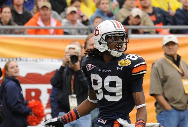 TAMPA, FL - JANUARY 1: Wide receiver Darvin Adams #89 of the Auburn Tigers looks for a pass against the Northwestern Wildcats in the Outback Bowl January 1, 2010 at Raymond James Stadium in Tampa, Florida.  (Photo by Al Messerschmidt/Getty Images)