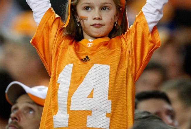 ATLANTA - DECEMBER 31:  A young female Tennessee Volunteers fan holds up a sign to show her support from the stands during the Chick-Fil-A Bowl between the Tennessee Volunteers and the Virginia Tech Hokies at the Georgia Dome on December 31, 2009 in Atlanta, Georgia.  Virginia Tech beat Tennessee 37-14.  (Photo by Mike Zarrilli/Getty Images)