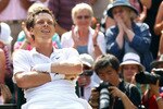 LONDON, ENGLAND - JUNE 30:  Tomas Berdych of Czech Republic celebrates match point during his Quarter Final match against Roger Federer of Switzerland on Day Nine of the Wimbledon Lawn Tennis Championships at the All England Lawn Tennis and Croquet Club on June 30, 2010 in London, England.  (Photo by Julian Finney/Getty Images)