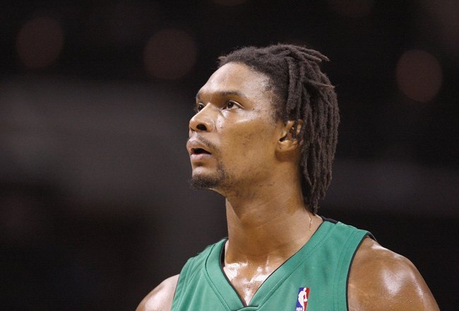 CHARLOTTE, NC - MARCH 16:  Chris Bosh #4 of the Toronto Raptors looks on against the Charlotte Bobcats during their game at Time Warner Cable Arena on March 16, 2009 in Charlotte, North Carolina.  NOTE TO USER: User expressly acknowledges and agrees that, by downloading and/or using this Photograph, user is consenting to the terms and conditions of the Getty Images License Agreement. (Photo by: Streeter Lecka/Getty Images)