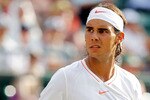 LONDON, ENGLAND - JUNE 30:  Rafael Nadal of Spain in action during his Quarter Final match against Robin Soderling of Sweden on Day Nine of the Wimbledon Lawn Tennis Championships at the All England Lawn Tennis and Croquet Club on June 30, 2010 in London, England.  (Photo by Matthew Stockman/Getty Images)