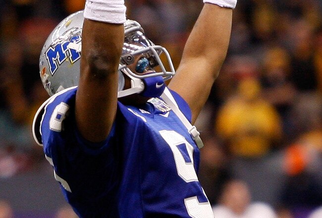 NEW ORLEANS - DECEMBER 20:  Dwight Dasher #9 of the Middle Tennessee Blue Raiders celebrates after throwing a touchdown pass against the Southern Miss Golden Eagles during the R+L Carriers New Orleans Bowl at the Louisiana Superdome on December 20, 2009 in New Orleans, Louisiana.  (Photo by Chris Graythen/Getty Images)