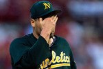 ST. LOUIS - JUNE 19: Starting pitcher Ben Sheets #15 of the Oakland Athletics reacts after giving up a two-run home run against the St. Louis Cardinals at Busch Stadium on June 19, 2010 in St. Louis, Missouri.  The Cardinals beat the Athletics 4-3.  (Photo by Dilip Vishwanat/Getty Images)