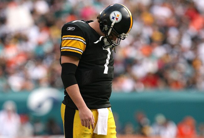 MIAMI - JANUARY 03:  Quarterback Ben Roethlisberger #7 of the Pittsburgh Steelers walks back to the huddle after injuring his shoulder in the fourth quarter against the Miami Dolphins at Land Shark Stadium on January 3, 2010 in Miami, Florida. The Steelers defeated the Dolphins 30-24.  (Photo by Doug Benc/Getty Images)