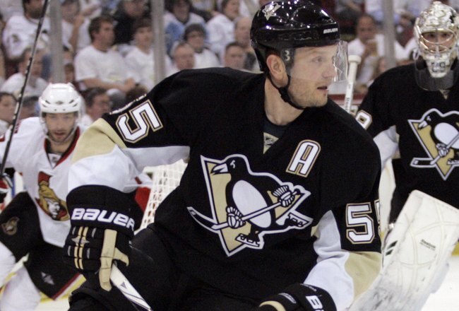 PITTSBURGH - APRIL 22:  Sergei Gonchar #55 of the Pittsburgh Penguins carries the puck up ice against the Ottawa Senators in Game Five of the Eastern Conference Quarterfinals during the 2010 NHL Stanley Cup Playoffs at Mellon Arena on April 22, 2010 in Pittsburgh, Pennsylvania.  The Senators defeated the Penguins 4-3 in triple overtime.  (Photo by Justin K. Aller/Getty Images)