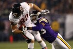 MINNEAPOLIS - NOVEMBER 30:  Greg Olsen #82 of the Chicago Bears is tackled by Cedric Griffin #23 of the Minnesota Vikings at the Metrodome on November 30, 2008 in Minneapolis, Minnesota.  (Photo by Jonathan Ferrey/Getty Images)