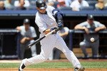 NEW YORK - JULY 01:  Nick Swisher #33 of the New York Yankees connects on a  first inning double against the Seattle Mariners on July 1, 2010 at Yankee Stadium in the Bronx borough of New York City.  (Photo by Jim McIsaac/Getty Images)