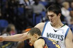 MINNEAPOLIS, MN - APRIL 7: Darko Milicic #31 of the Minnesota Timberwolves guards against Stephen Curry #30 of the Golden State Warriors in the second half of a basketball game at Target Center on April 7, 2010 in Minneapolis, Minnesota. The Warriors defeated the Timberwolves 116-107. NOTE TO USER: User expressly acknowledges and agrees that, by downloading and or using this Photograph, user is consenting to the terms and conditions of the Getty Images License Agreement.  (Photo by Hannah Foslien /Getty Images)