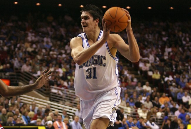 ORLANDO, FL - NOVEMBER 1:  Darko Milicic #31 of the Orlando Magic holds the ball against the Chicago Bulls on November 1, 2006 at TD Waterhouse Centre in Orlando, Florida. The Magic won 109-94. NOTE TO USER: User expressly acknowledges and agrees that, by downloading and or using this photograph, User is consenting to the terms and conditions of the Getty Images License Agreement. (Photo by Doug Benc/Getty Images)