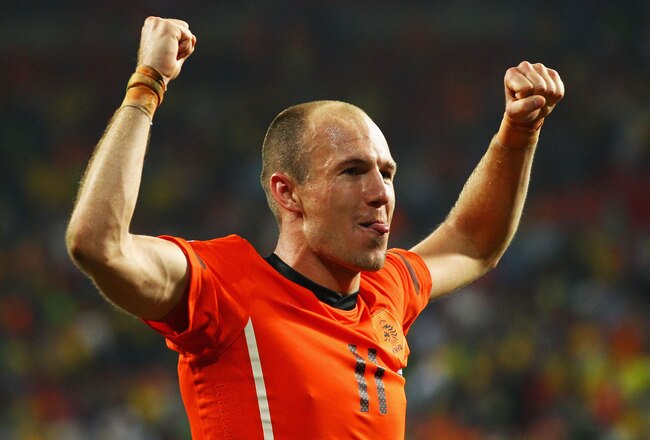 PORT ELIZABETH, SOUTH AFRICA - JULY 02:  Arjen Robben of the Netherlands celebrates victory following the 2010 FIFA World Cup South Africa Quarter Final match between Netherlands and Brazil at Nelson Mandela Bay Stadium on July 2, 2010 in Nelson Mandela Bay/Port Elizabeth, South Africa.  (Photo by Richard Heathcote/Getty Images)