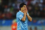 PORT ELIZABETH, SOUTH AFRICA - JUNE 26:  Luis Suarez of Uruguay reacts during the 2010 FIFA World Cup South Africa Round of Sixteen match between Uruguay and South Korea at Nelson Mandela Bay Stadium on June 26, 2010 in Nelson Mandela Bay/Port Elizabeth, South Africa.  (Photo by Laurence Griffiths/Getty Images)