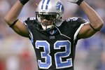 DETROIT - SEPTEMBER 10:  Dre Bly #32 of the Detroit Lions engages the crowd during the game against the Seattle Seahawks on September 10, 2006 at Ford Field in Detroit, Michigan. The Seahawks defeated the Lions 9-6.  (Photo by Lisa Blumenfeld/Getty Images)