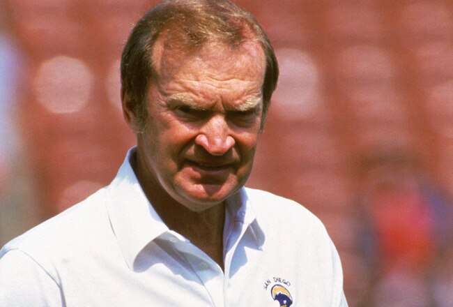 LOS ANGELES - 1986:  Head coach Don Coryell of the San Diego Chargers walks on the field before a 1986 NFL game against the Los Angeles Raiders at the LA Memorial Coliseum in Los Angeles, California.  The Raiders defeated the Chargers 17-13.  (Photo by Rick Stewart/Getty Images)