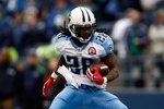 SEATTLE , WA - JANUARY 03:  Chris Johnson #28 of the Tennessee Titans runs with the ball against the Seattle Seahawks at Qwest Field on January 3, 2010 in Seattle, Washington. Johnson ran for 134 yards to break the 2,000 yard mark for the season.  (Photo by Jonathan Ferrey/Getty Images)